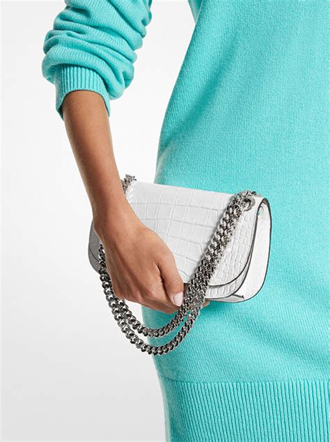 christie crocodile embossed leather envelope bag 